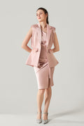 She is wearing Aurelia Open-Back Feather Blazer at VandaMod