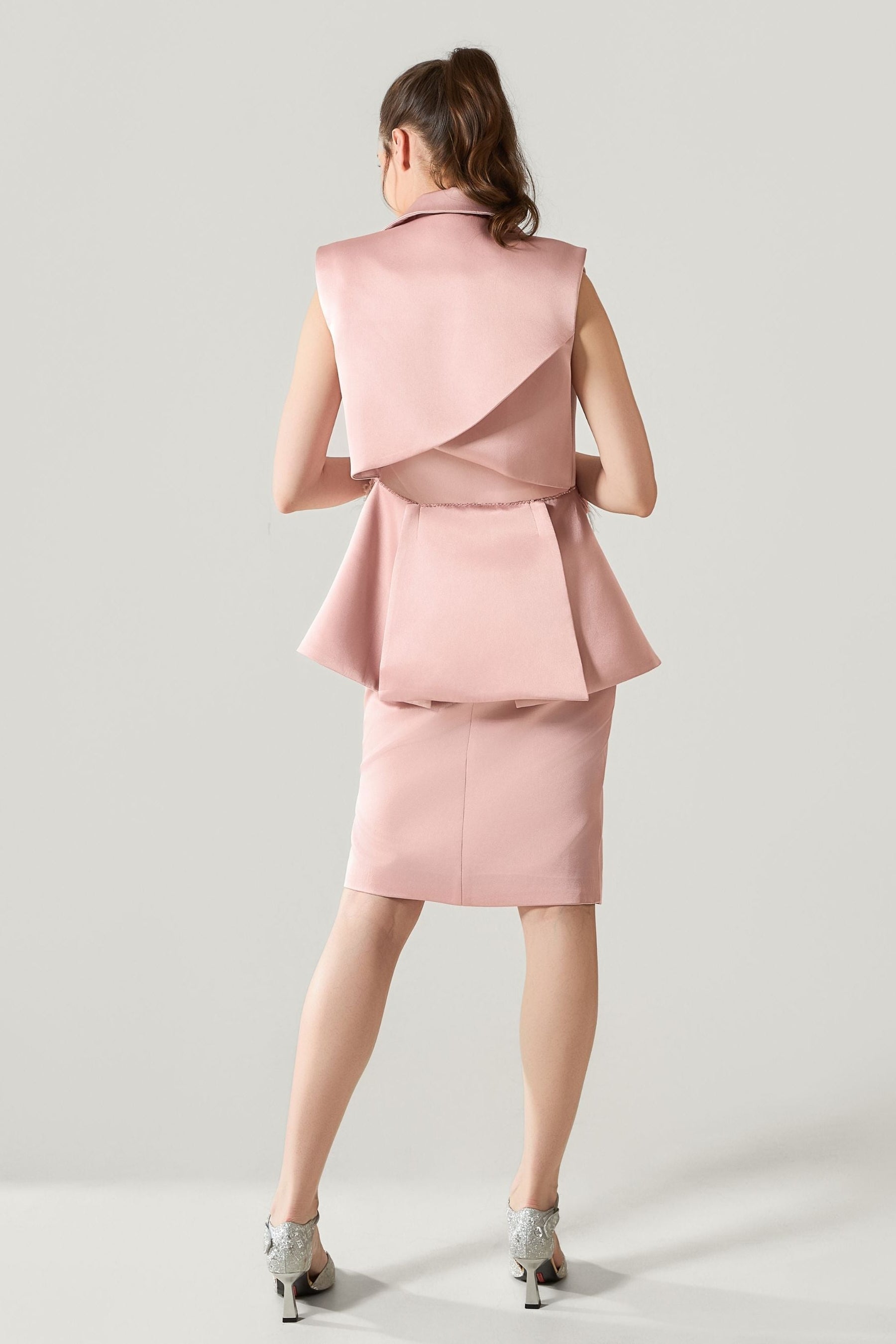 She is wearing Aurelia Sculpted Polysilk Skirt at VandaMod