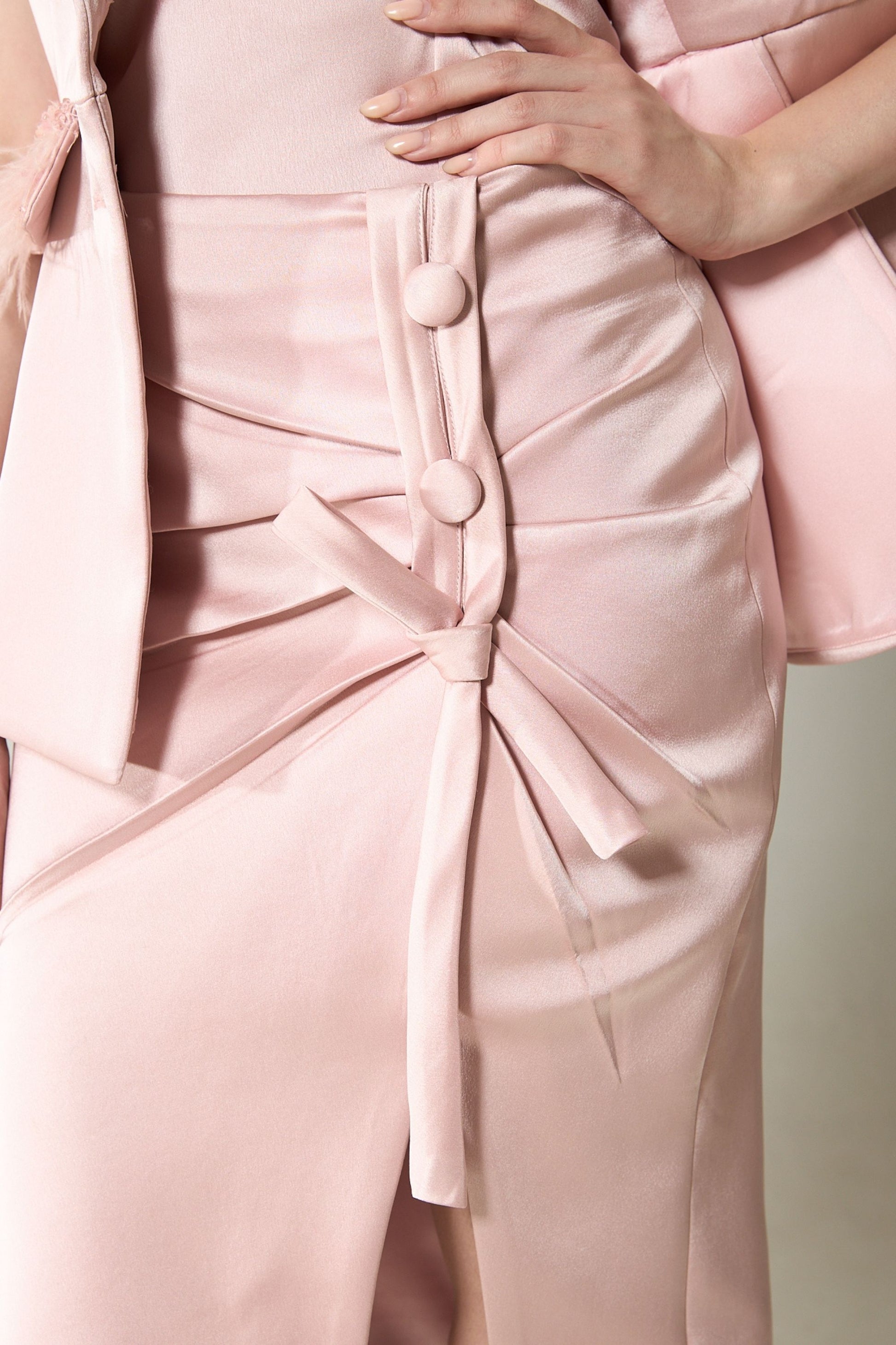 She is wearing Aurelia Sculpted Polysilk Skirt at VandaMod