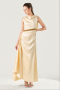 She is wearing  Celeste Champagne Polysilk Dress at VandaMod