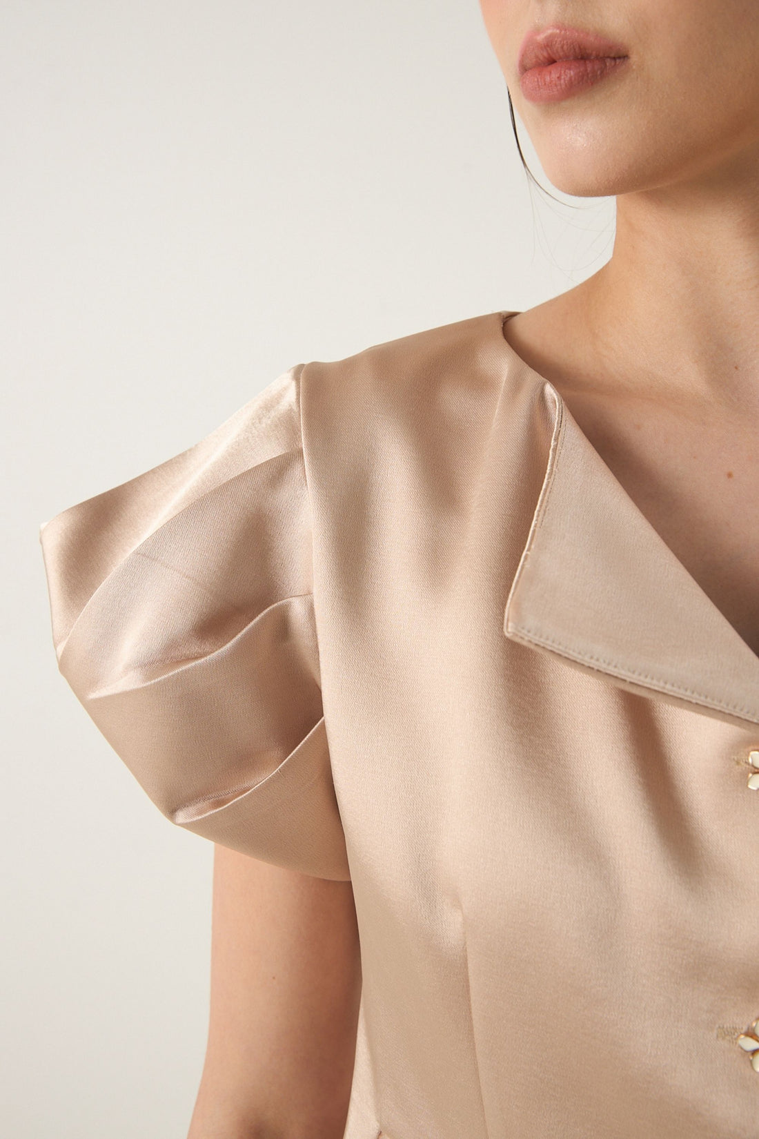 She is wearing Clara Convertible Neck Polysilk Top at VandaMod