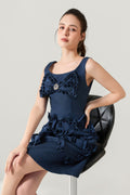 Woman wearing Luna_Sculpted_Denim_Dress, which is a navy blue dress with floral details at VandaMod 