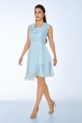 Woman wearing a light blue dress on a white background from vandamod designer fashion sg