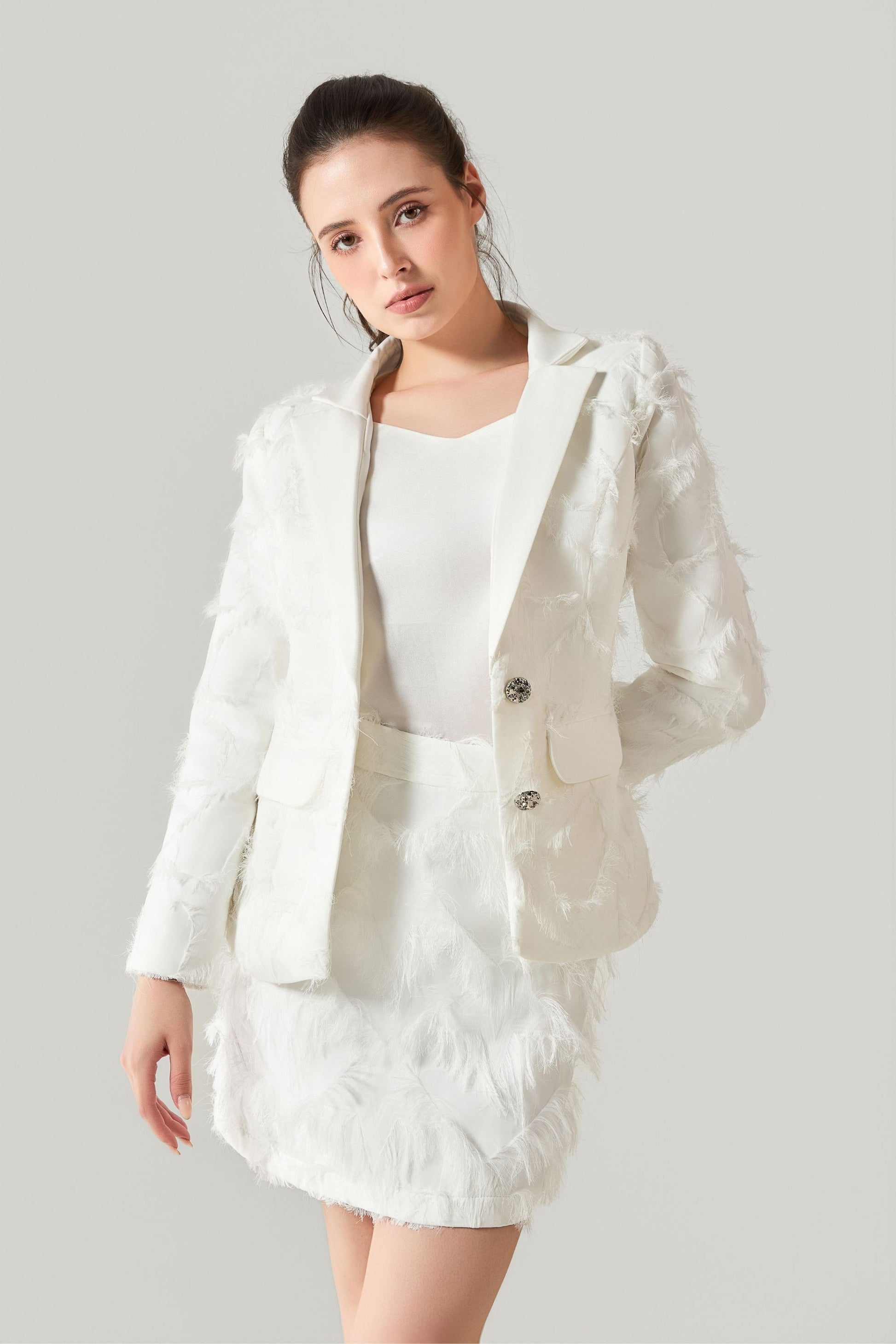 She is wearing Stella Appliqué Statement Blazer at VandaMod